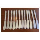 Set of 12 community plate butter knives with “M” monogram