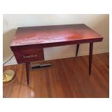 Vintage table with cherry like finish. Needs refinished