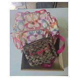 Two Coach-style purses as shown. These appear to be knock-offs or imitation pieces and have not been professionally authenticated. Authenticity is not guaranteed. Selling as-is. Suitable for use, disp