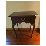 Ethan Allen wooden side table with single drawer and lower shelf. Traditional furniture piece suitable for living room, bedroom, or accent use. Shows wear consistent with age and normal household use.