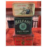 Three vintage tobacco tins as shown. Includes assorted tobacco advertising tins with printed graphics and age-related wear. Decorative collectible group suitable for display.