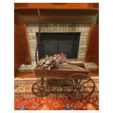 Express wooden child’s wagon with removable side rails and metal wheels. Features red painted wood body with “Express” branding and pull handle. Shows age and use consistent with vintage play eq