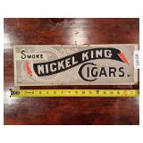 Nickel King Cigars metal advertising sign with printed cigar-themed graphics. Vintage-style tobacco advertising piece suitable for display in a collection, bar, shop, or man cave.