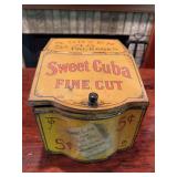 Sweet Cuba Fine Cut tobacco tin with printed advertising graphics. Rectangular tin measures approximately 8 in. x 8 in. x 10 in. Decorative vintage advertising collectible with age-related wear.