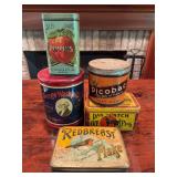 Five vintage tins as shown. Includes assorted advertising and storage tins with printed graphics and age-related wear. Decorative collectible group suitable for display.