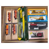 2 flats of HO scale train cars