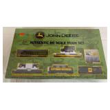 John Deere authentic HO scale train set with locomotive, John Deere-themed rolling stock, billboard, track and power supply. Set includes a 14-piece 45" x 36" oval of roadbed track.