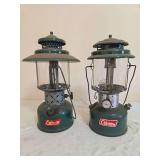 Coleman Models 228E & 220F Lanterns – 220F Marked 12/71. Pair of vintage green double-mantle pressure lanterns with green porcelain ventilators, clear globes and wire bail handles; show paint wear, 