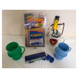 Group of Planters Mr. Peanut collectibles including Johnny Lightning Racing Dreams die-cast car, Planters semi truck, mugs/cups and Mr. Peanut figure as shown. Mixed materials and condition.