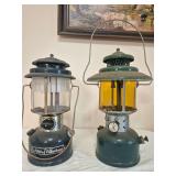 Coleman Powerhouse 290 & Model 228E Lanterns – Marked 3/86 & 6/58. Includes later Powerhouse adjustable lantern and vintage wide-ventilator 228E with amber globe; both have green finishes and wire b