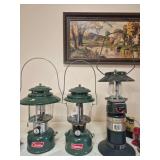 Coleman Models 228F, 220H & 5152C700 Electronic-Ignition Lanterns – Marked 10/69 & 2/74. Includes two green liquid-fuel pressure lanterns and a Coleman electronic-ignition propane lantern; clear glo