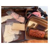 Assorted vintage purses, handbags, wallets and gloves including tooled leather and mixed-material examples as shown.
