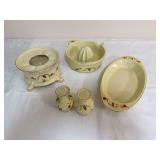 Assortment of Hall Autumn Leaf and China Specialties pieces including a footed warmer, citrus juicer/reamer, pair of salt and pepper shakers, and oval serving dish. The footed warmer is marked Genuine