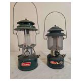 Coleman Models 220F & CL2/288 Lanterns – Marked 6/65 & 6/85. Green double-mantle pressure lanterns with clear globes and wire bail handles; the CL2 features adjustable light output, with age-related