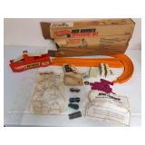 Vintage Mattel Hot Wheels Rod Runner Speedway Set with original box, orange track, Rod Runner speed-control unit, trestles/accessories, instructions and several cars as shown. Includes extras; box and