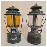 Coleman Models 220K & 220D Lanterns – Marked 3/81 & A/51. Pair of green double-mantle pressure lanterns with matching ventilators, clear globes and wire bail handles; shows varying age-related finis