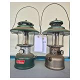 Coleman Models 228F & 228D Lanterns – 228F Marked 9/68. Vintage wide-ventilator pressure lanterns with green and nickel-tone founts, clear globes and wire bail handles; shows age-related wear and ox
