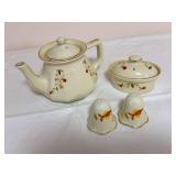 Group of Hall Autumn Leaf pieces including lidded teapot marked “Made Expressly for N.A.L.C.C. by Hall China 2004,” covered oval dish marked NALCC / Hall China 2008, and matching salt and pepper s