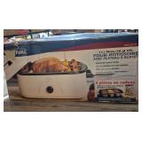 Rival Select 18-Quart Roaster Oven with Buffet Tray. Boxed 18-quart electric roaster oven with removable roasting pan and rack, tempered-glass window lid and buffet serving tray; model RO180 BR shown 