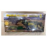 Athearn John Deere Collector’s Edition HO scale train set, 3rd in the series and dated 1999, numbered 03466. Includes two detailed 1:87 scale John Deere/Ertl die-cast toys.