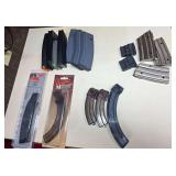 Assorted rifle magazines including AR-style, Ruger Mini-14, Ruger .22 and Marlin Model 795 magazines in various capacities and materials. Includes packaged ProMag Marlin 795 .22 LR and Ram-Line magazi