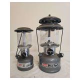 Coleman Models 226 & 285 Lanterns – Marked 1/93 & 3/93. Compact and full-size Coleman pressure lanterns with dark gray/green finishes, clear globes and wire carrying handles; shows general age-relat