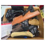 Mixed box of pistol holsters including leather, nylon and molded polymer examples in assorted sizes and configurations. Includes Fobus and other makers as shown.