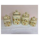 China Specialties Autumn Leaf four-piece canister set with lidded Coffee, Flour, Sugar and Tea canisters in cream glaze with the familiar multicolor Autumn Leaf decoration and gold-tone trim. Appears 