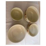 Set of three Hall Rayed Autumn Leaf bowls plus an additional serving bowl, with cream interiors and Autumn Leaf decoration. Extra serving bowl has a chip.