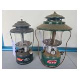 Coleman Adjustable & Wide-Ventilator Pressure Lanterns. Includes green adjustable two-mantle lantern and earlier wide-ventilator green pressure lantern with clear globes and wire bail handles; shows p