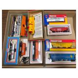 2 flats of HO scale train cars