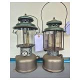 Coleman Models QL & 220D Lanterns – 220D Marked B/50. Vintage pressure lanterns with nickel-tone founts, green porcelain ventilators and glass globes; shows age-related oxidation, finish wear and su