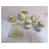 Six-piece Hall Autumn Leaf group including a covered sugar bowl, pitcher, lidded teapot, salt and pepper shakers and “Autumn Leaf Collector’s Prayer” plaque. Pitcher and teapot are marked “Mad