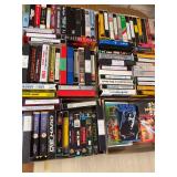 At least 6 flats of VHS tapes and 3 stands