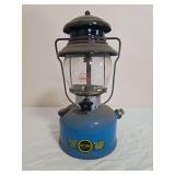 Sears Roebuck Model 476.74550 pressure lantern with blue fount, black ventilator, clear Coleman-marked globe and Sears Roebuck and Co. decal; marked 1/67. Shows paint wear, oxidation and age-related u