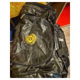 City of Kent Fire Department Leather Duffel Bag. Black leather multi-compartment travel/equipment bag with embroidered City of Kent Fire Department emblem, zippered compartments, shoulder strap and ca