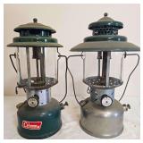Coleman Models 220F & 228D Lanterns – Marked 9/65 & B/48. Vintage double-mantle pressure lanterns with green porcelain ventilators, clear globes and wire bail handles; one has a nickel-tone fount, w