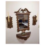 Coordinated wall décor grouping with carved wood-tone eagle mirror, matching pair of candle sconces and matching demilune wall shelf, plus small decorative house as shown. Shows general age-related w