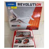 Horizon Hobby Revolution Ascent MTX RTF remote-control airplane and Syma Speed S5 three-channel gyroscope remote-control helicopter, both in original boxes.