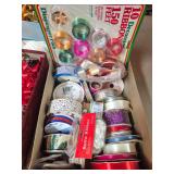Large Assortment of Vintage & Later Ribbon. Box contains numerous spools and packages of satin, decorative and gift-wrapping ribbon in assorted colors, widths and patterns, including Dispenser Pack de