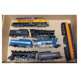 Group of assorted HO scale locomotives and tenders including Chessie System/B&O diesel, several steam locomotives, Royal Blue and Chattanooga tenders, and additional diesel unit as shown. Mixed makers