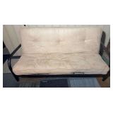 Futon. 39” tall by 80” wide by 43” deep. Currently zip tied to not open