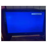 Phillips TV with no base. Diagonal measurement was 52”. Powered on but no cable or antenna