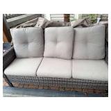 Plastic bench with cushions and cover