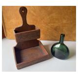 Wood shelf and green bottle