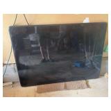Piece of granite. Black in color. 51” long by 36” wide. Heavy