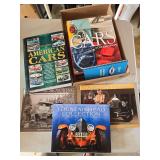 Flat of old car books