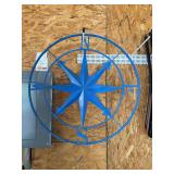 Metal compass sign