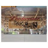 Budweiser and Pabst mirrors with some damage