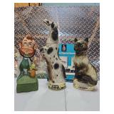 3 decanters and a decanter collector book